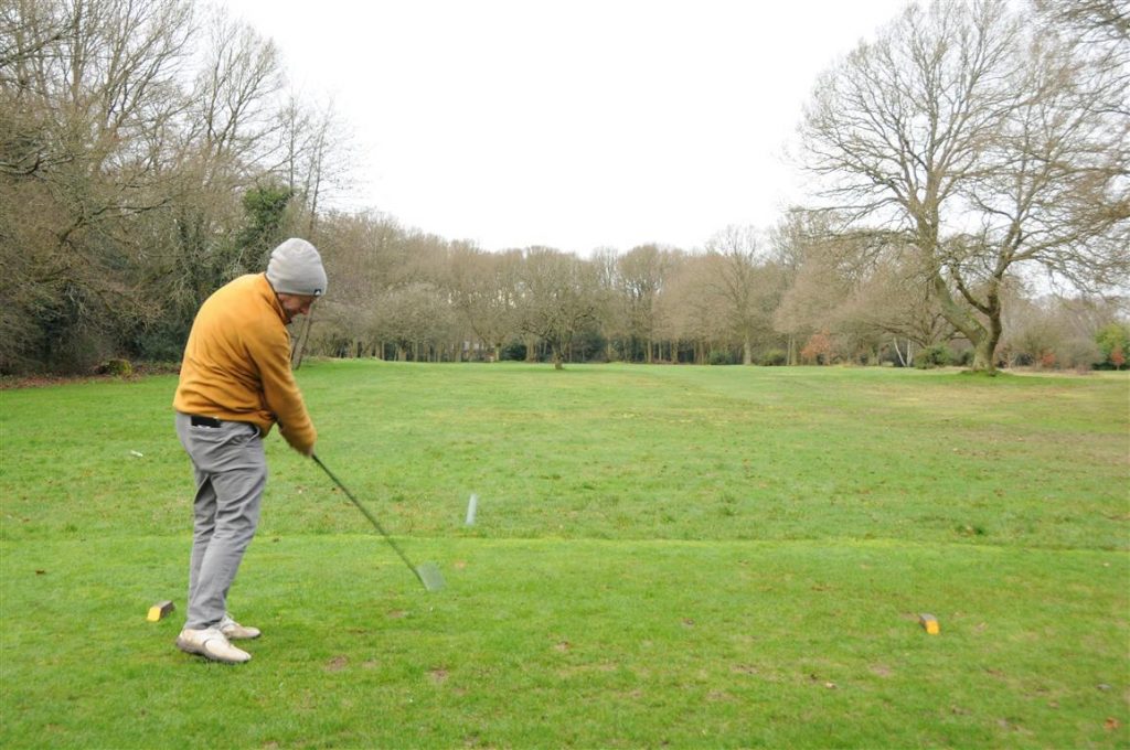 Rick Rankin drives off the 1st tee